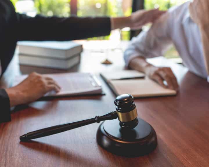 professional lawyer discussing legal options and solutions with a client in San Antonio